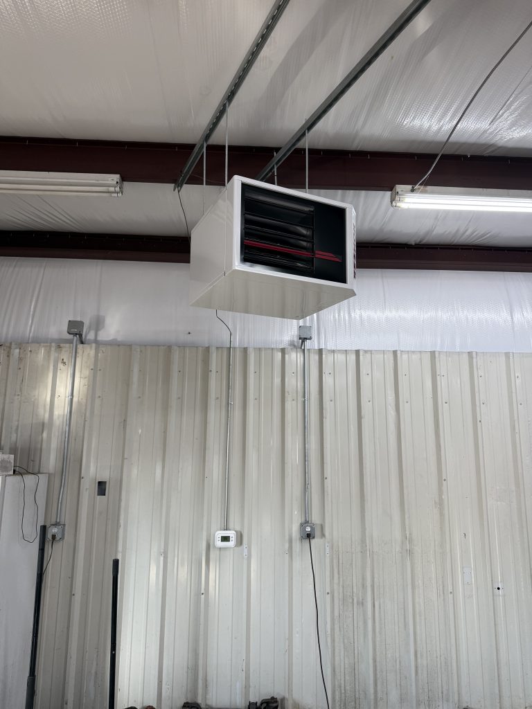 Unit heater installed in a garage workshop