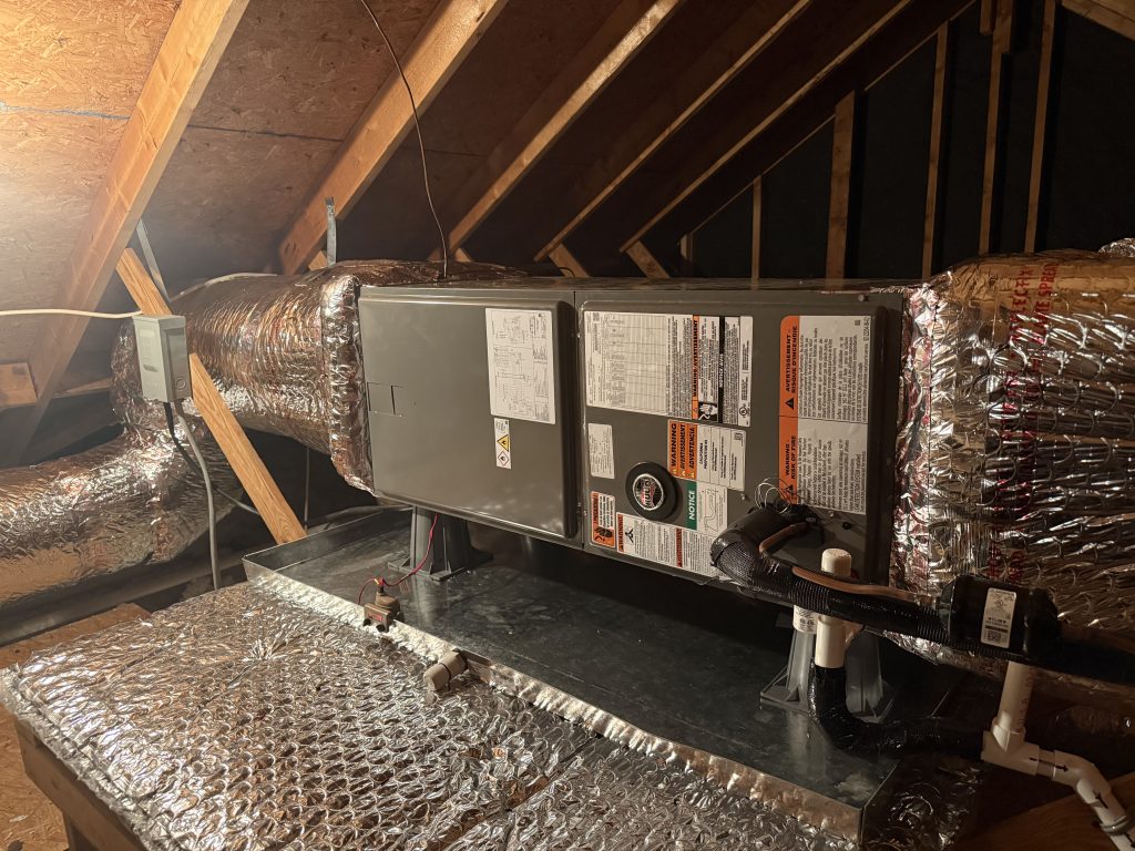 New air handler installed in an attic space